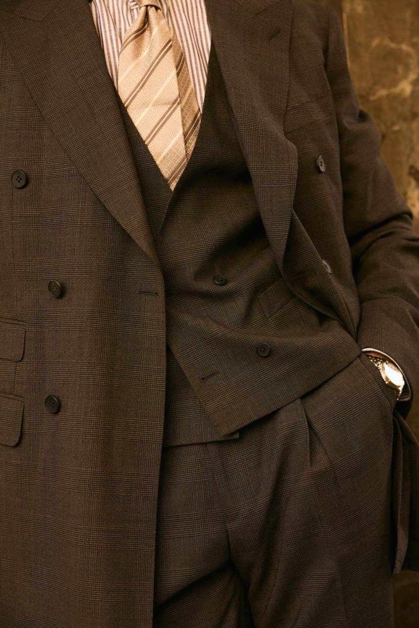 The buttoning detail on a finished jacket front
