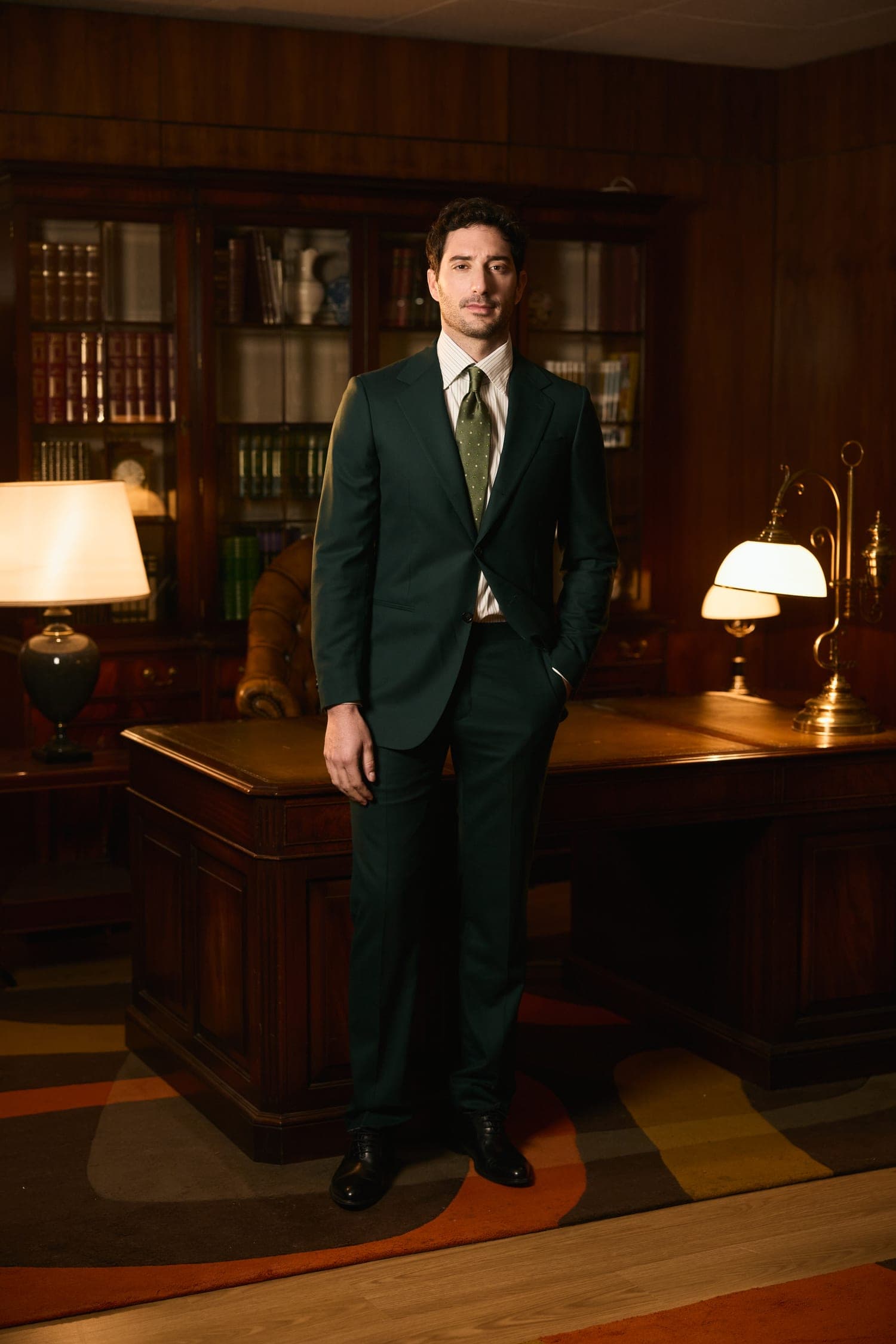 A bottle green suit in fresco wool