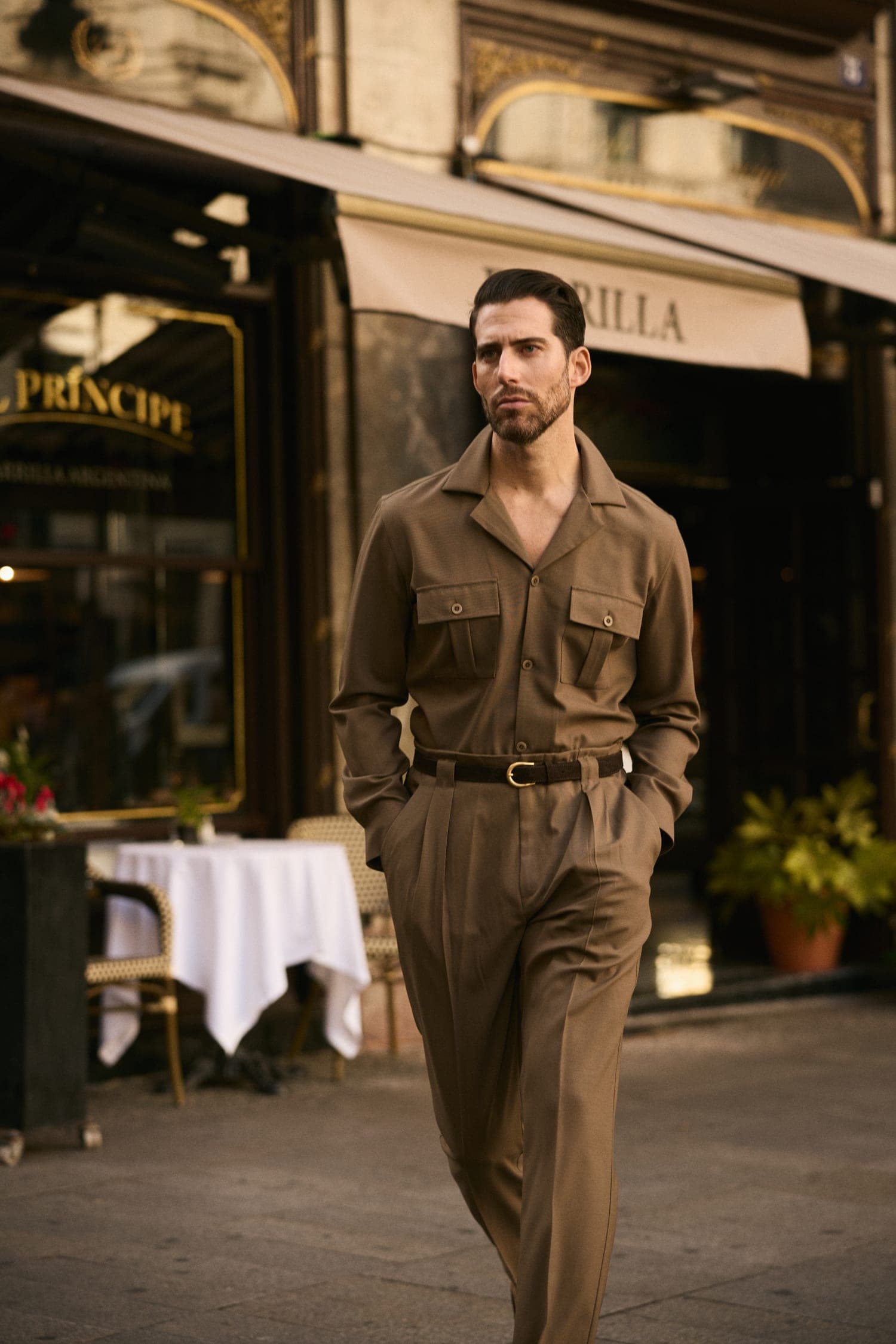A belted safari suit in cotton drill